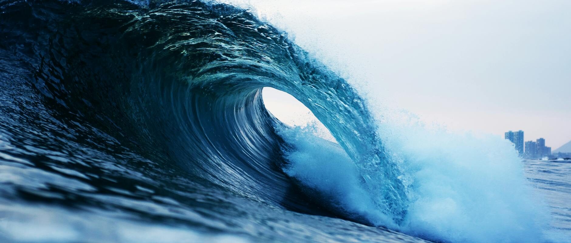 photography of barrel wave